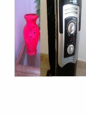 Calefación eletrica  y un  jarrón para velas